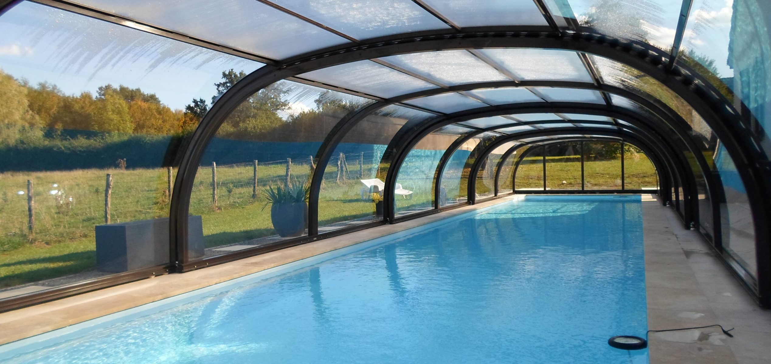 Abri de piscine haut - Piscine & Spas by Carré Vert